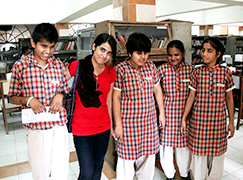 Group of visually impaired girls with a volunteer woman